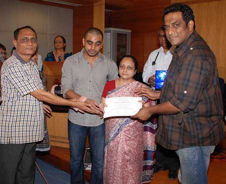 Anurag Basu felicitates staff nurse Sister Rita Patel Anurag Basu felicitates staff nurse Sister Rita Patel